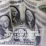 The dollar is on track for its fourth straight weekly rise, boosted by opposing signals from the BOJ and the Federal Reserve.